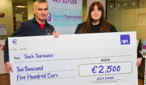 Teach Tearmainn receives €2,500 cheque as the AXA Local Community Award winners